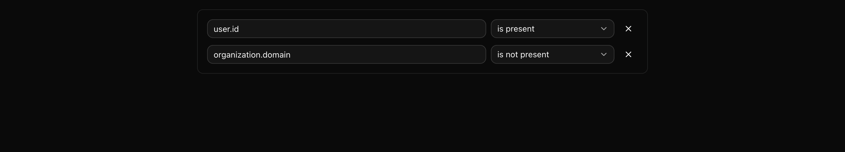 Two stacked targeting-rule rows, the first with operator "is present" on user.id and the second with "is not present" on organization.domain.